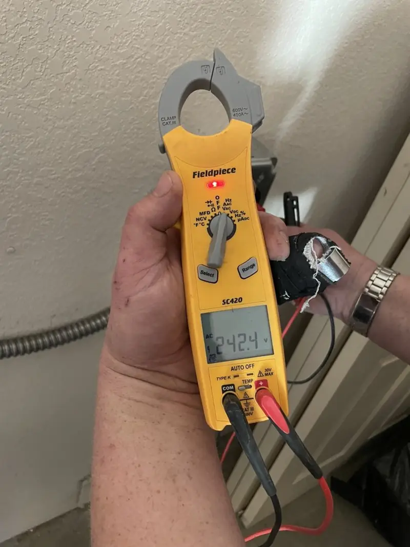 Voltage testing with clamp meter during Aluminum Wiring Replacement in Herndon